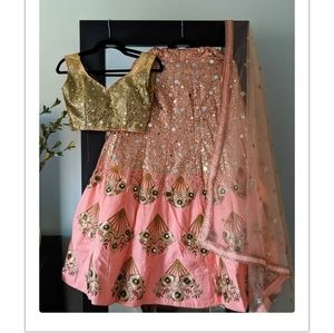 Heavily embellished gold and pink lehenga